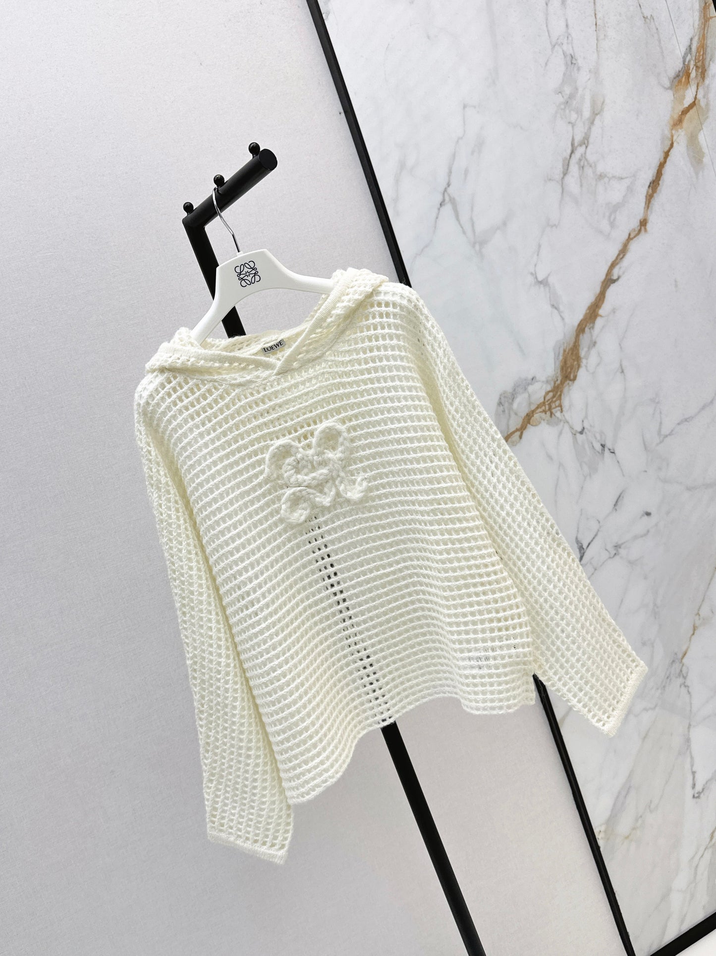 The latest autumn and winter three-dimensional crochet pattern hooded hollow knit sweater
