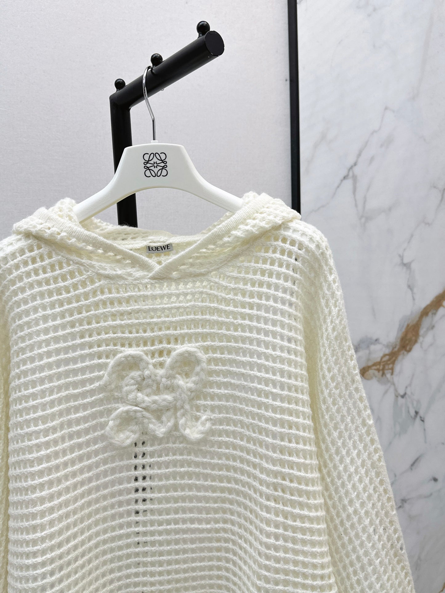 The latest autumn and winter three-dimensional crochet pattern hooded hollow knit sweater