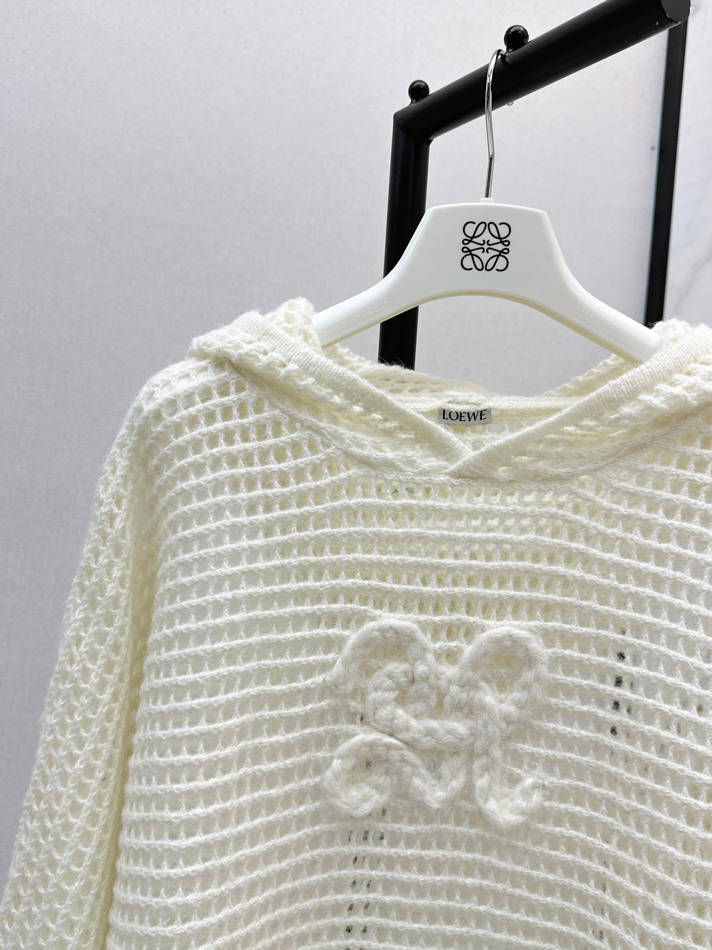 The latest autumn and winter three-dimensional crochet pattern hooded hollow knit sweater