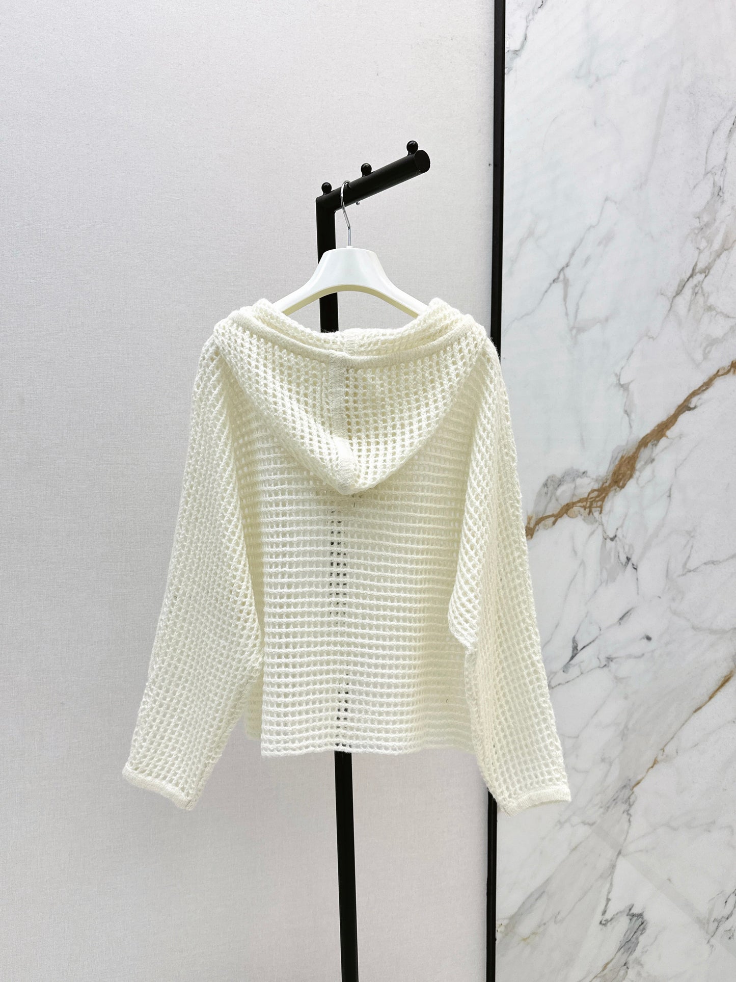 The latest autumn and winter three-dimensional crochet pattern hooded hollow knit sweater