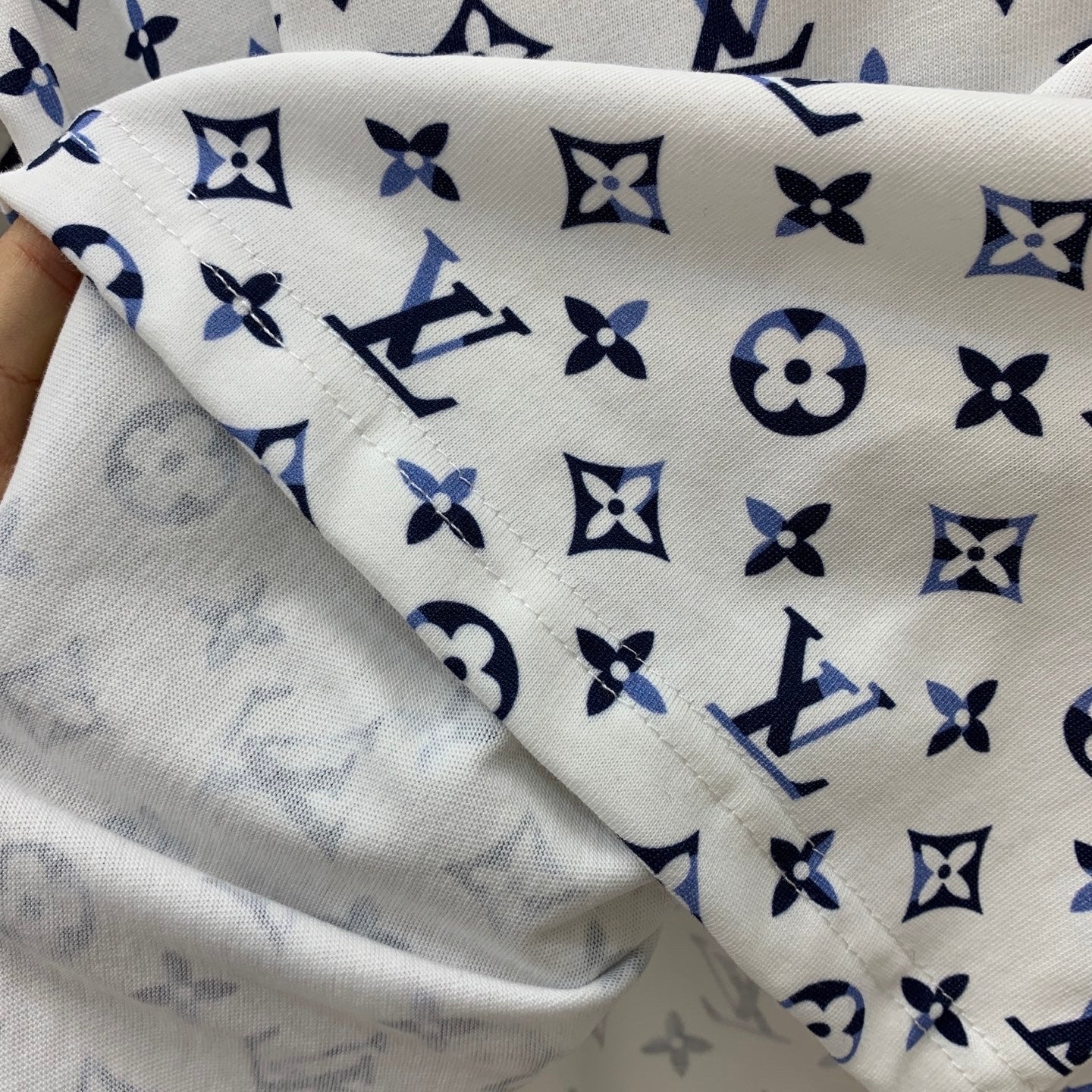 new style with all-over monogram lettering print