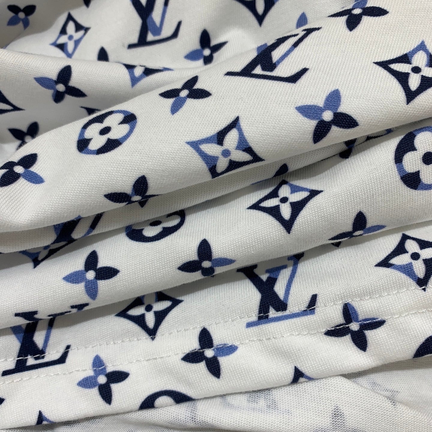new style with all-over monogram lettering print