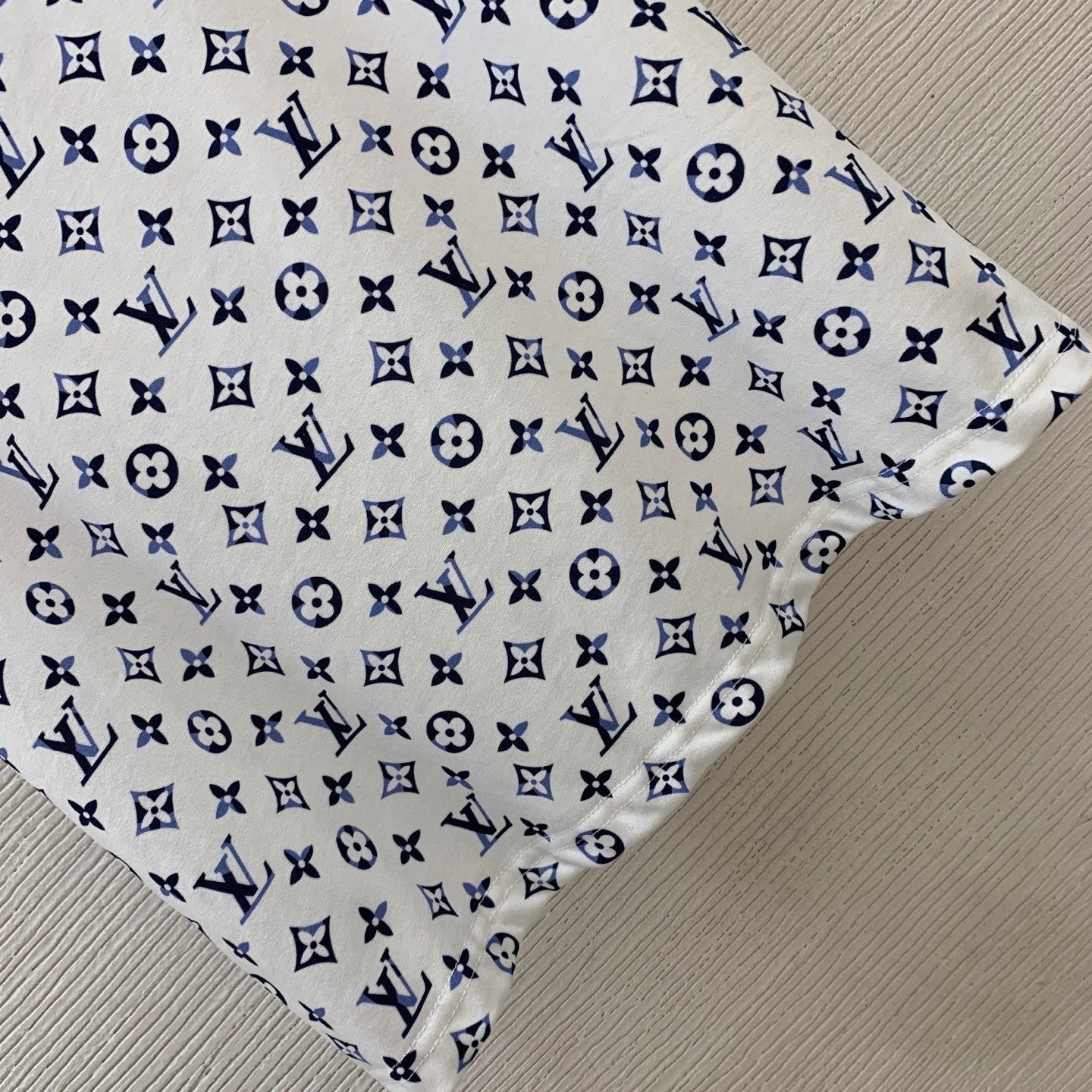 new style with all-over monogram lettering print