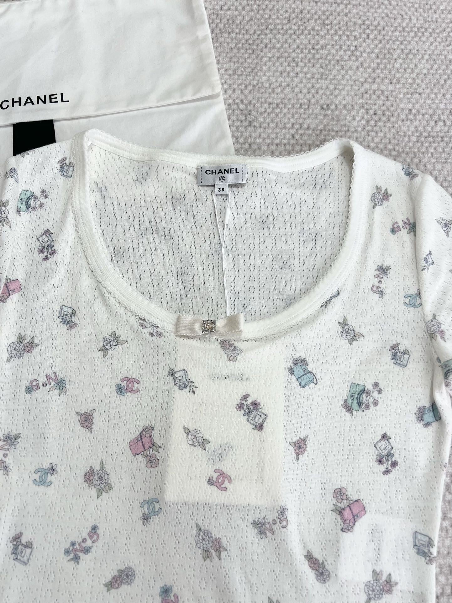 small rhinestones and letters on the back