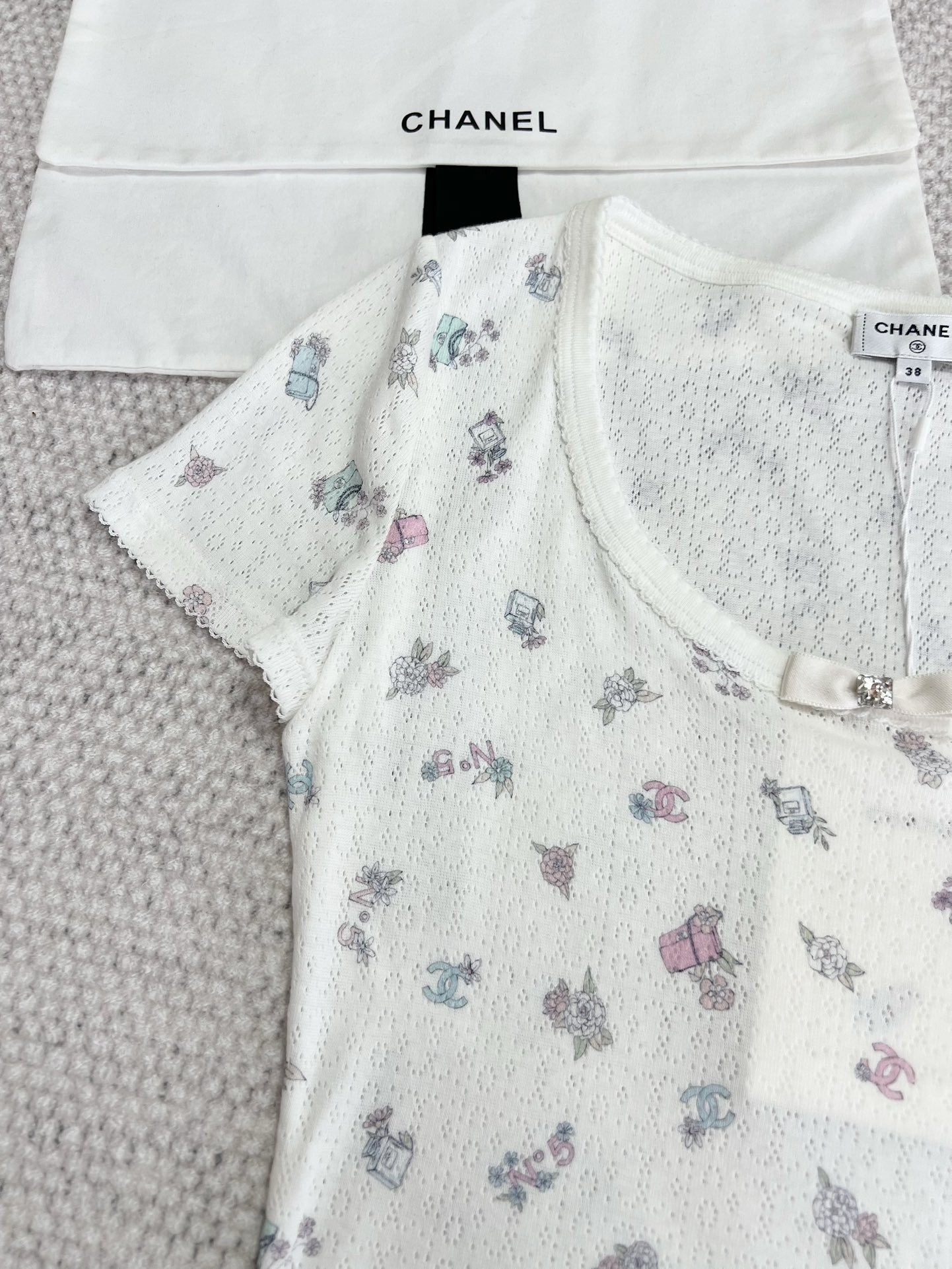 small rhinestones and letters on the back